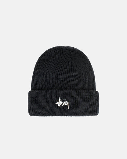 Black beanie with a white logo on a light gray background