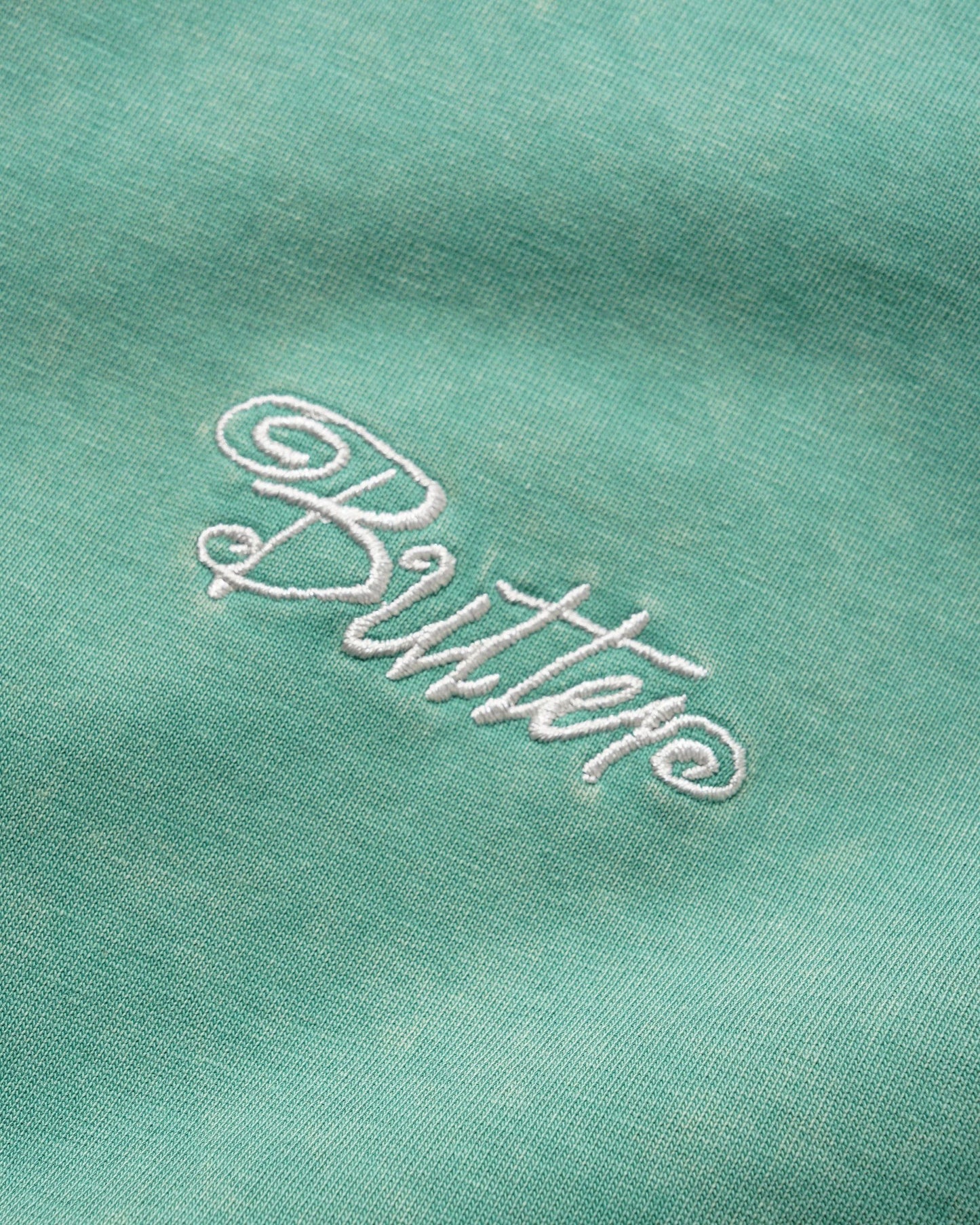 Butter Jive Overlock Stitch Tee: Distressed Jade
