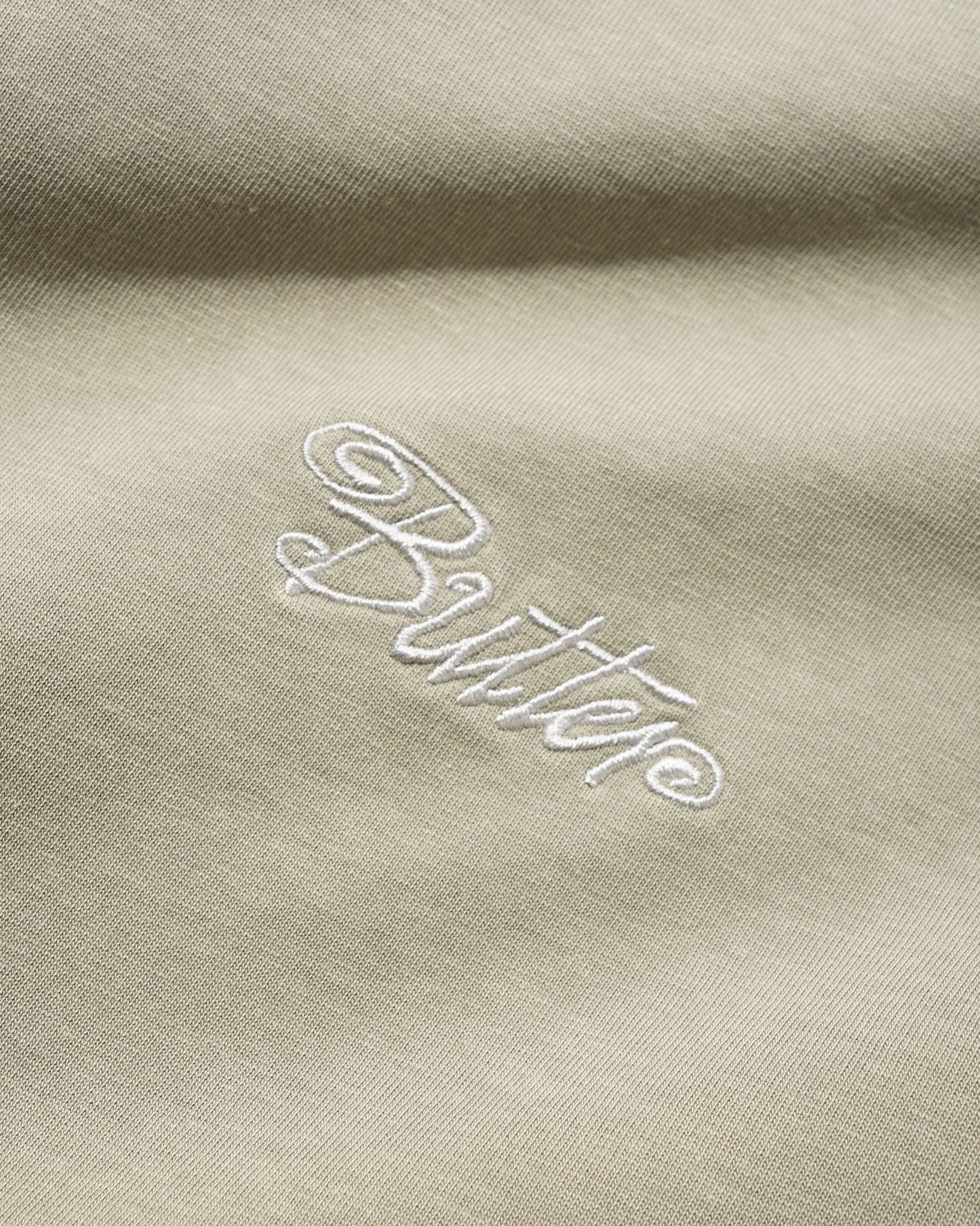 Butter Jive Overlock Stitch Tee: Distressed Cove