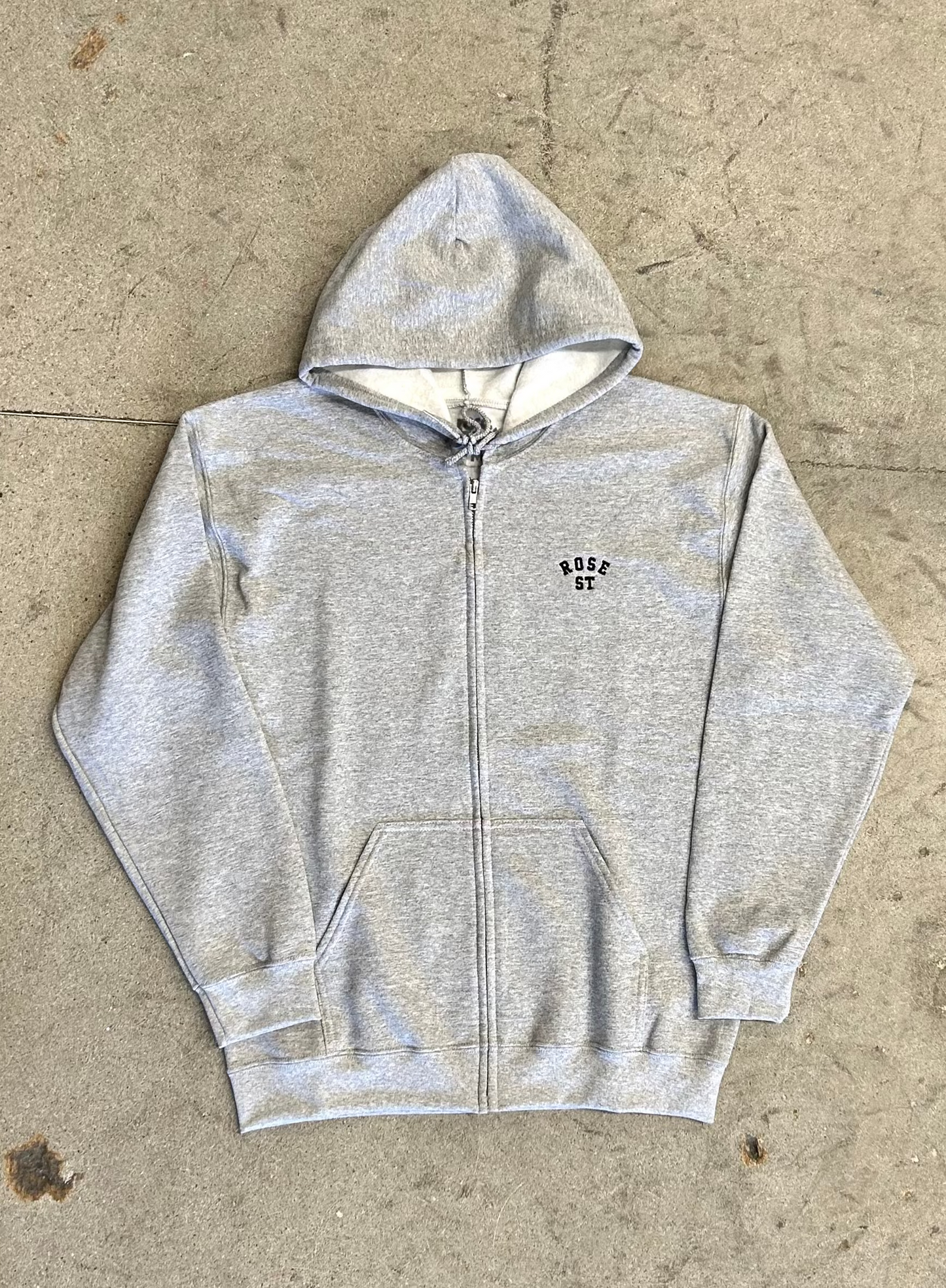 Gray hoodie rose street logo on front left chest. 