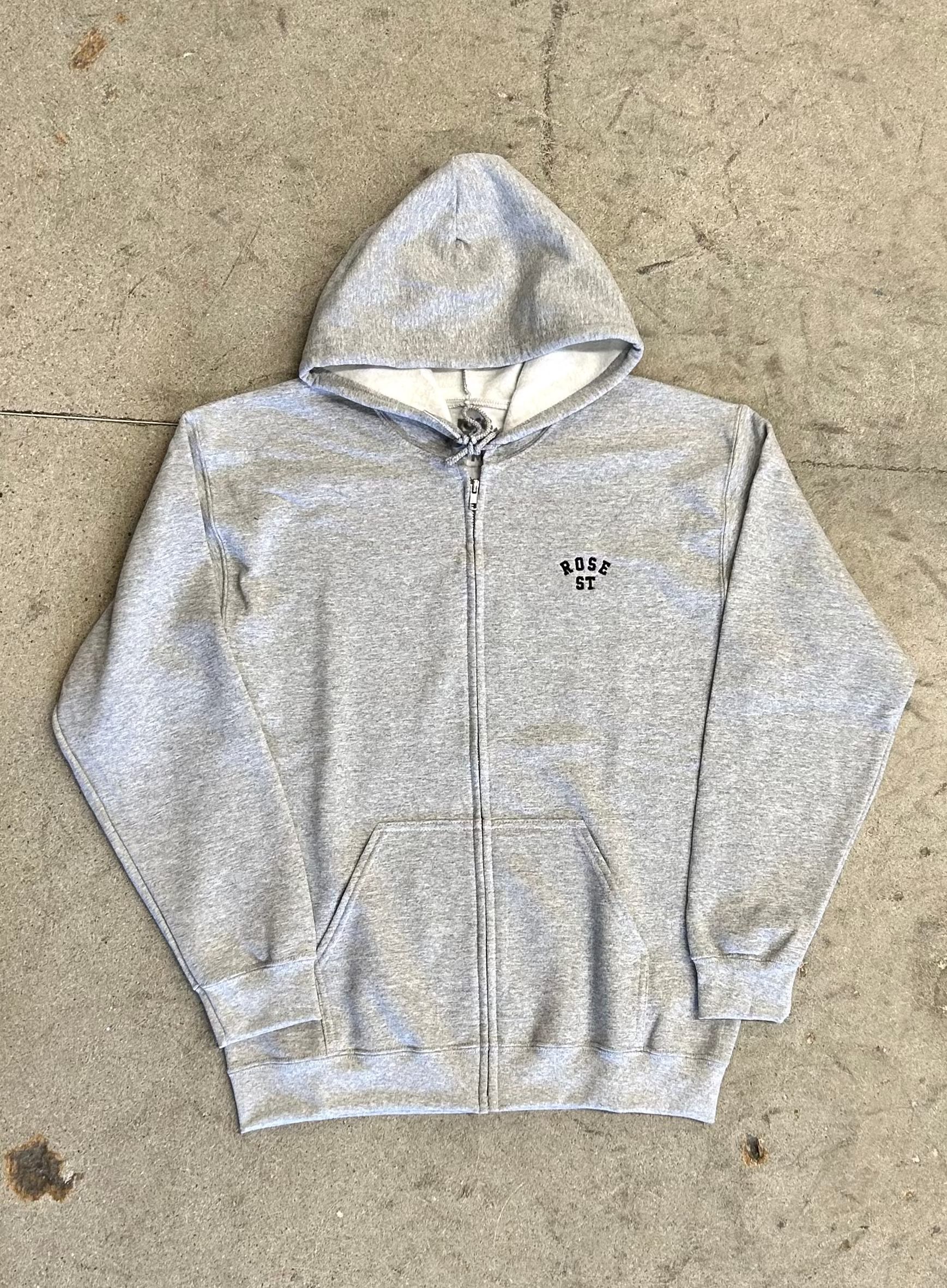 Gray hoodie rose street logo on front left chest. 