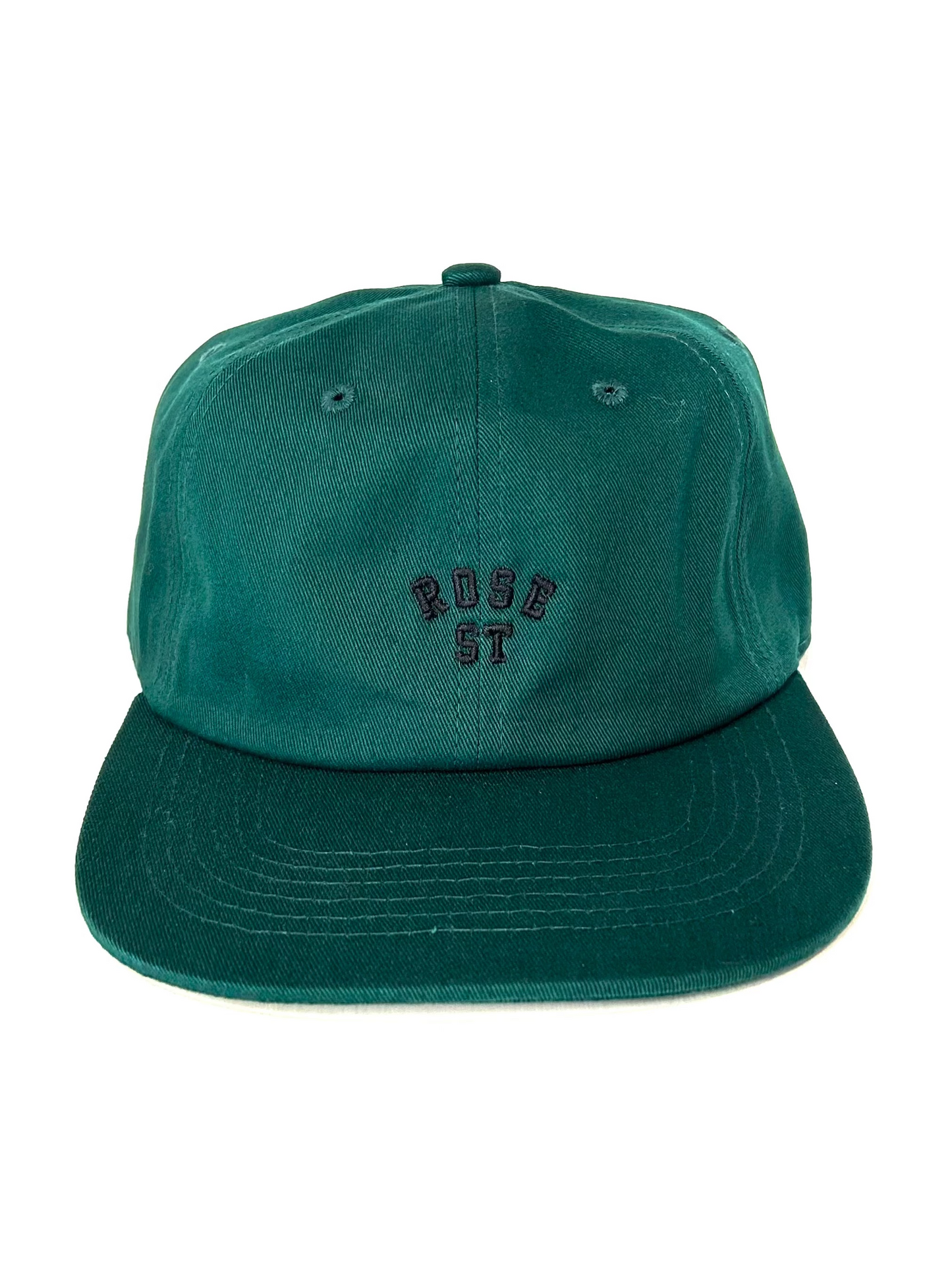 Green cap with "Rose Street" text on a white background