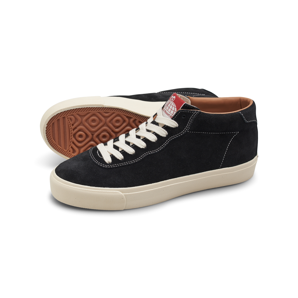 Black sneakers with white laces and brown soles on a white background