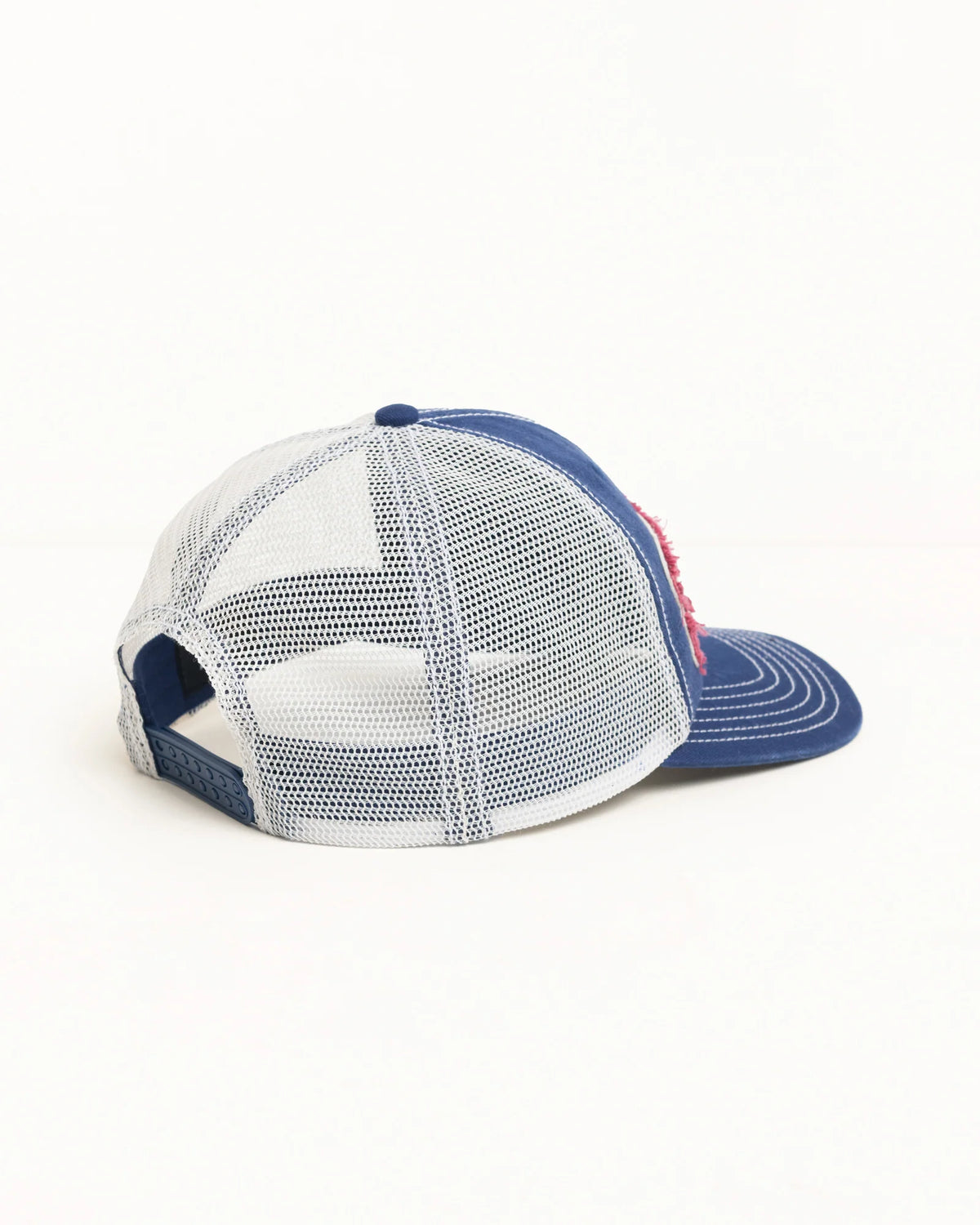 Blue and white mesh cap on a white background