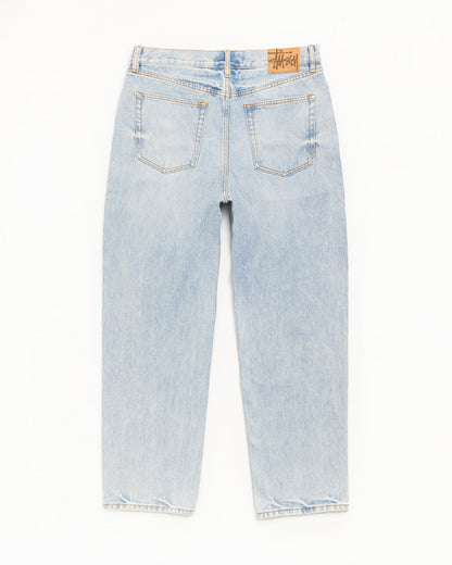 Light wash blue denim jeans shown from the back, featuring two back pockets and a brown leather brand patch on the waistband, photographed against a plain white background.